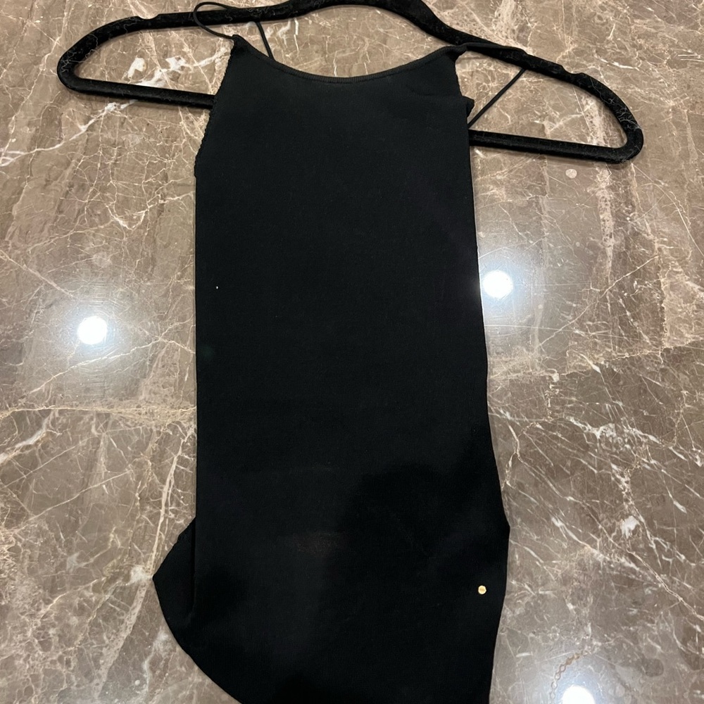 Esteban Cortazar black tank open back